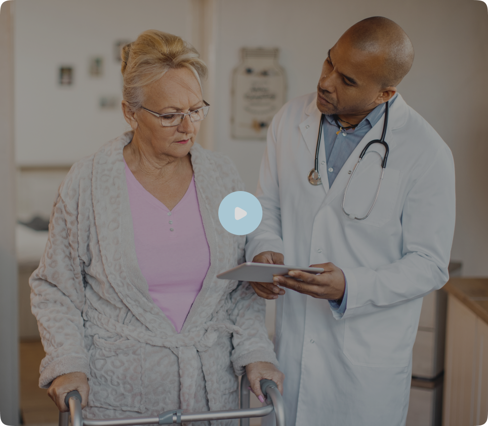Doctor helping elderly patient